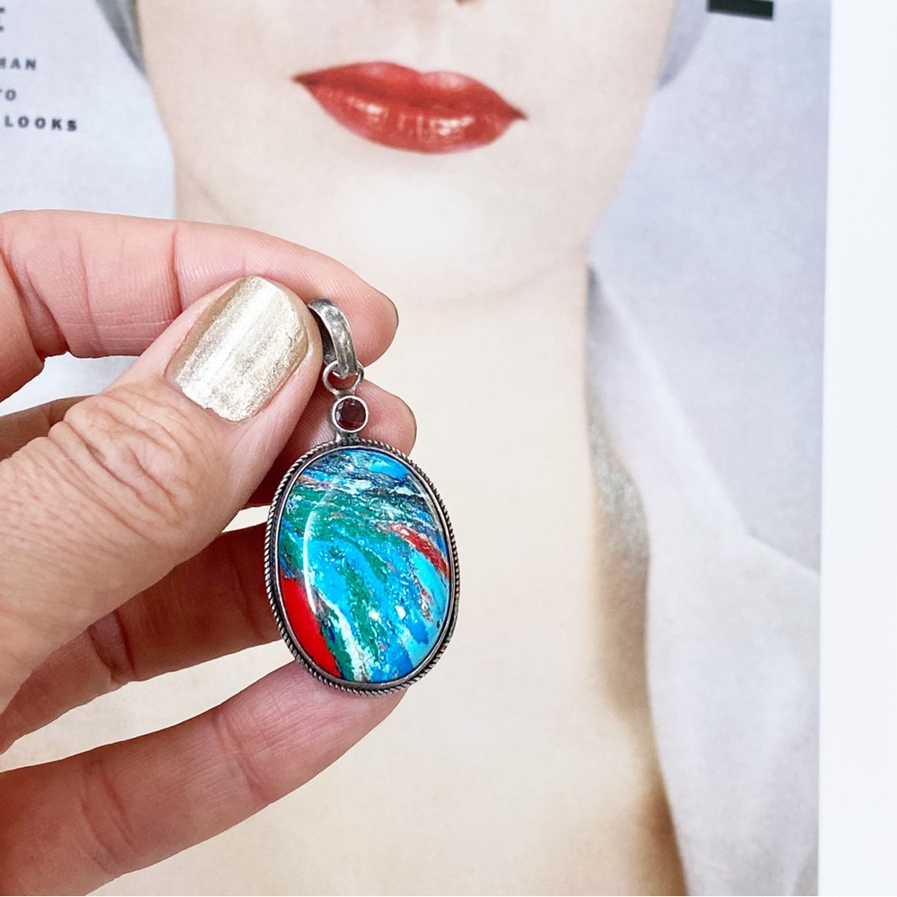 Sterling silver pendant with colourful stone cabochon.